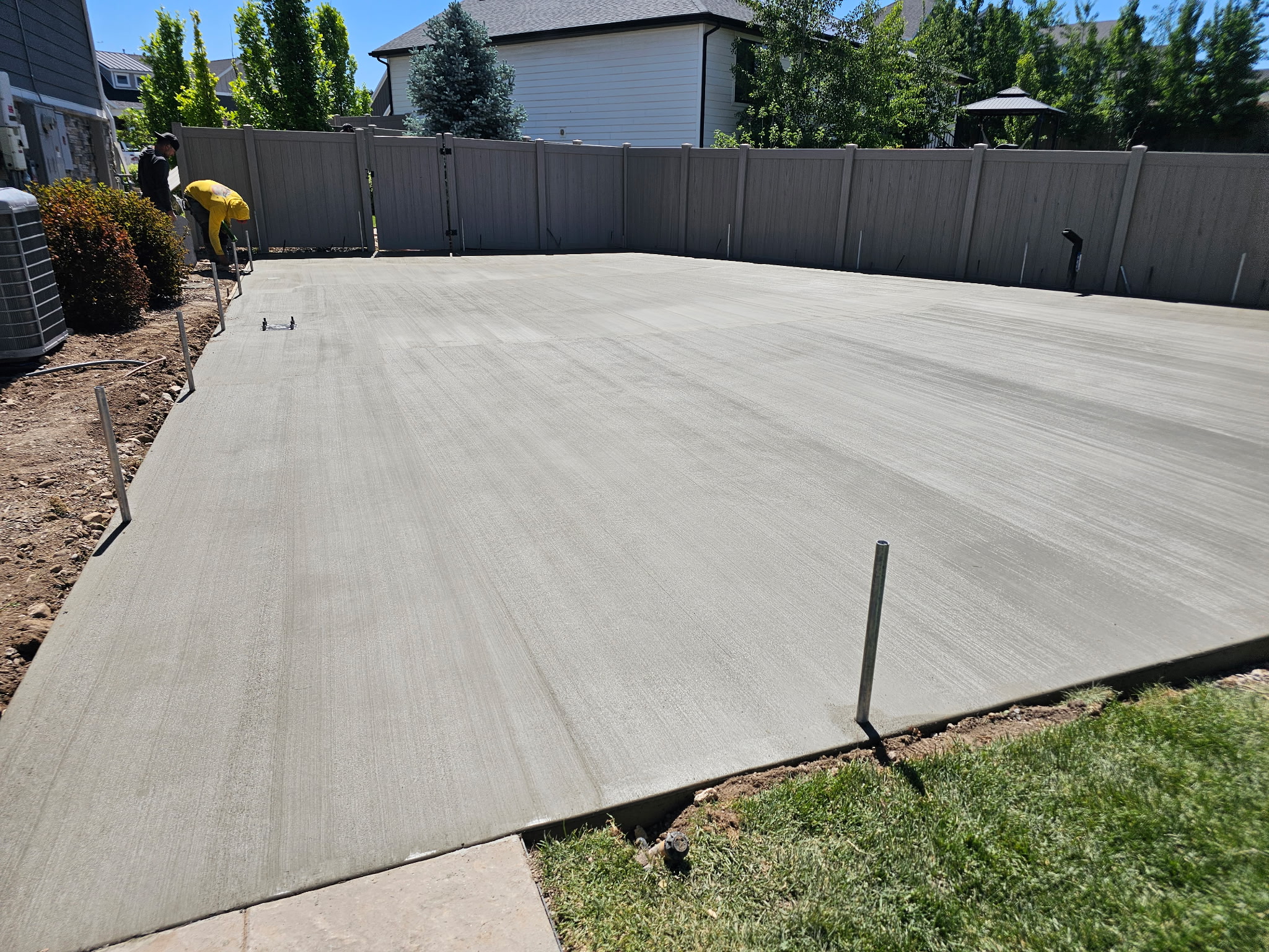 Finished backyard concrete patio in Utah